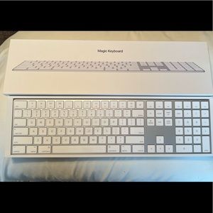 Apple Magic Keyboard with Numeric Pad. Comes with original box.
